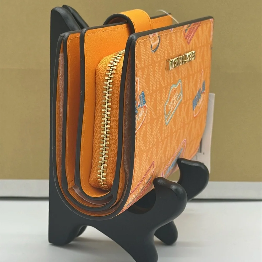 Michael Kors Jet Set Travel Medium Printed Signature Logo Bi-Fold 
Pop Orange - Picture 4 of 14
